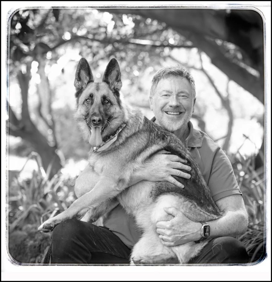Simon Carroll with his German Shepherd